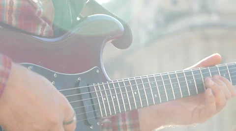 Man playing on guitar Stock Footage 44563304
