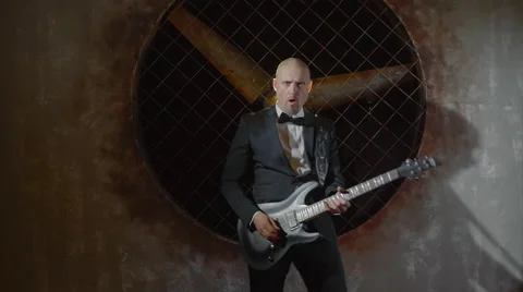 Man playing the guitar 스톡 동영상 61798355