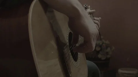 The man is playing the guitar Stock Footage 74244606