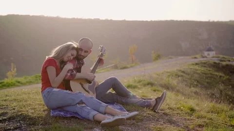Man playing guitar Stock Footage 75258043