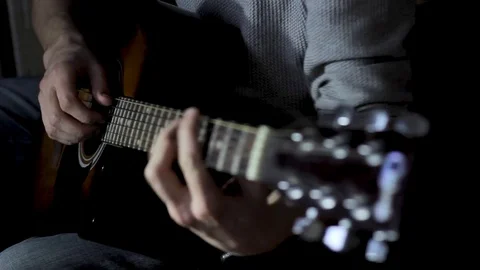 Man playing guitar Stock Footage 85142193
