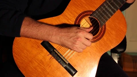 Man playing guitar Stock Footage 90690771