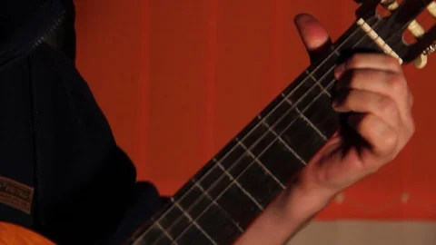 Man playing guitar Stock Footage 90690796