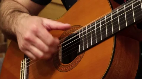 A man playing the guitar Stock Footage 153854833