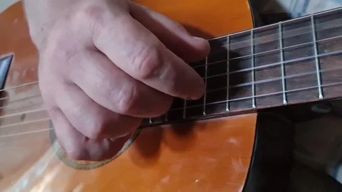 Man playing guitar Stock Footage 163094948