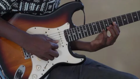 Man playing a guitar Stock Footage 219762257