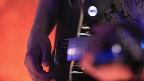 Man playing the guitar, hand close-up Stock Footage 99578252