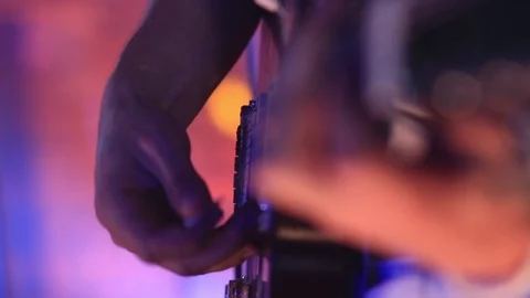 Man playing the guitar, hand close-up Stock Footage 101717136