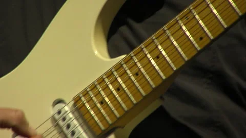 Man playing guitar inside building 스톡 동영상 290939890