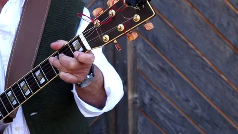 Man playing the guitar instrument Stock Footage 71204070