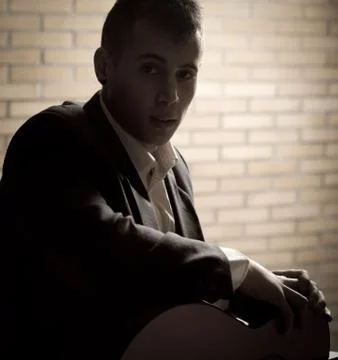 Man playing guitar Stock Photos