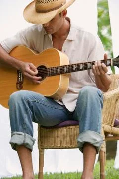 Man playing guitar Stock Photos
