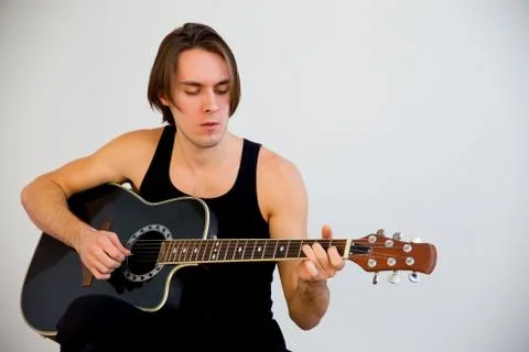 Man playing guitar Stock Photos
