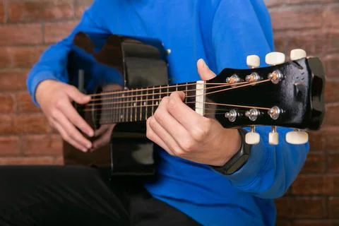 Man playing guitar Stock Photos