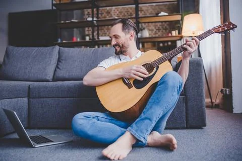 Man playing guitar Stock Photos