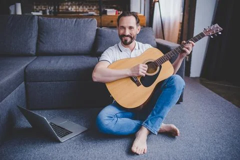 Man playing guitar Stock Photos