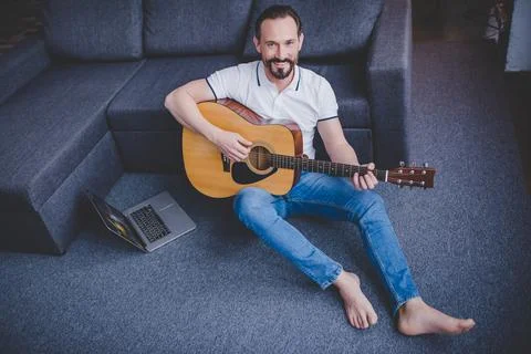 Man playing guitar Stock Photos