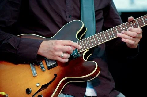 Man playing guitar Stock Photos
