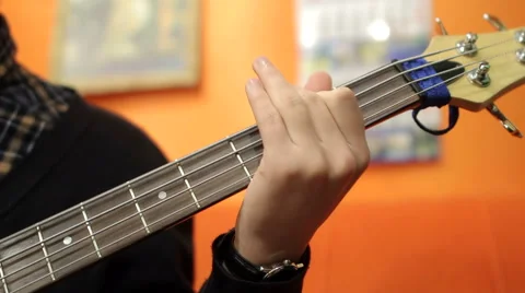 Man playing guitar in recording studio Stock Footage 53256557