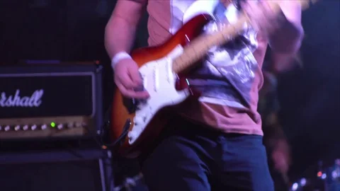 Man playing guitar solo 4k Stock Footage 69963362