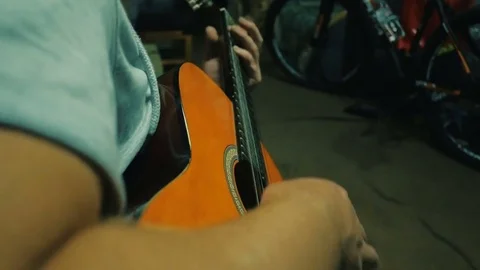 Man playing guitar in the studio. Shoulder view Stock Footage 83887715