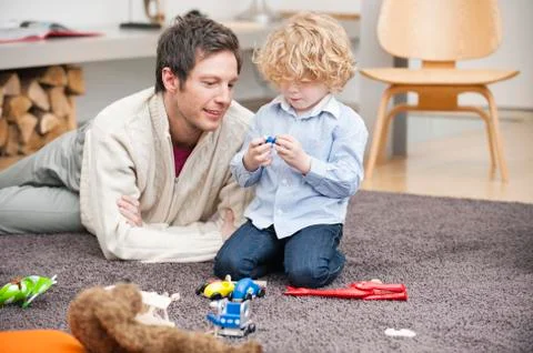 Man playing with his son Stock Photos