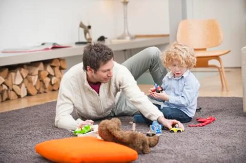 Man playing with his son Stock Photos