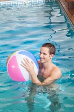 Man playing with inflatable ball Stock Photos