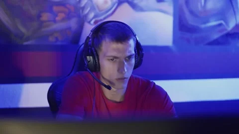 Man playing in Internet Cafe Online Video Gaming Tournament Stock Footage 136744328