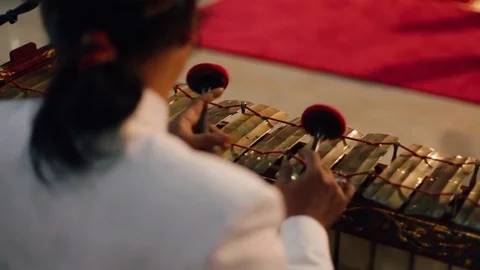 Man playing Javanese Gamelan Stock Footage 80041028