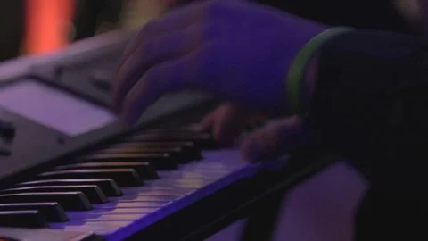 Man playing keyboard Stock Footage 73459415