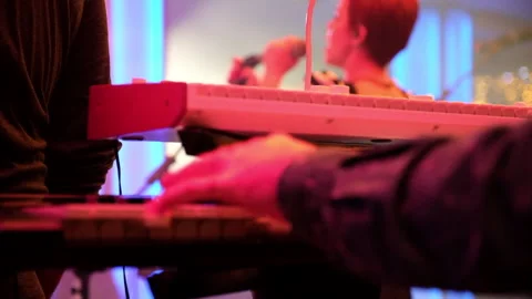 Man playing keyboard Stock Footage 155796105