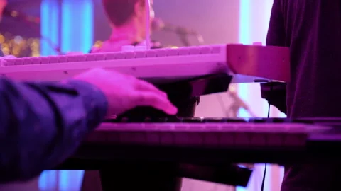 Man playing keyboard Stock Footage 155796116