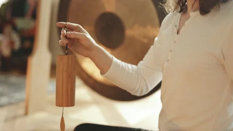 Man playing on Koshi Wind Chimes Sound Therapy 4K Stock Footage Stock Footage 92559815