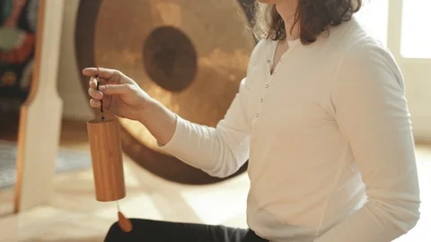 Man playing on Koshi Wind Chimes Sound Therapy 4K Stock Footage Stock Footage 92561561
