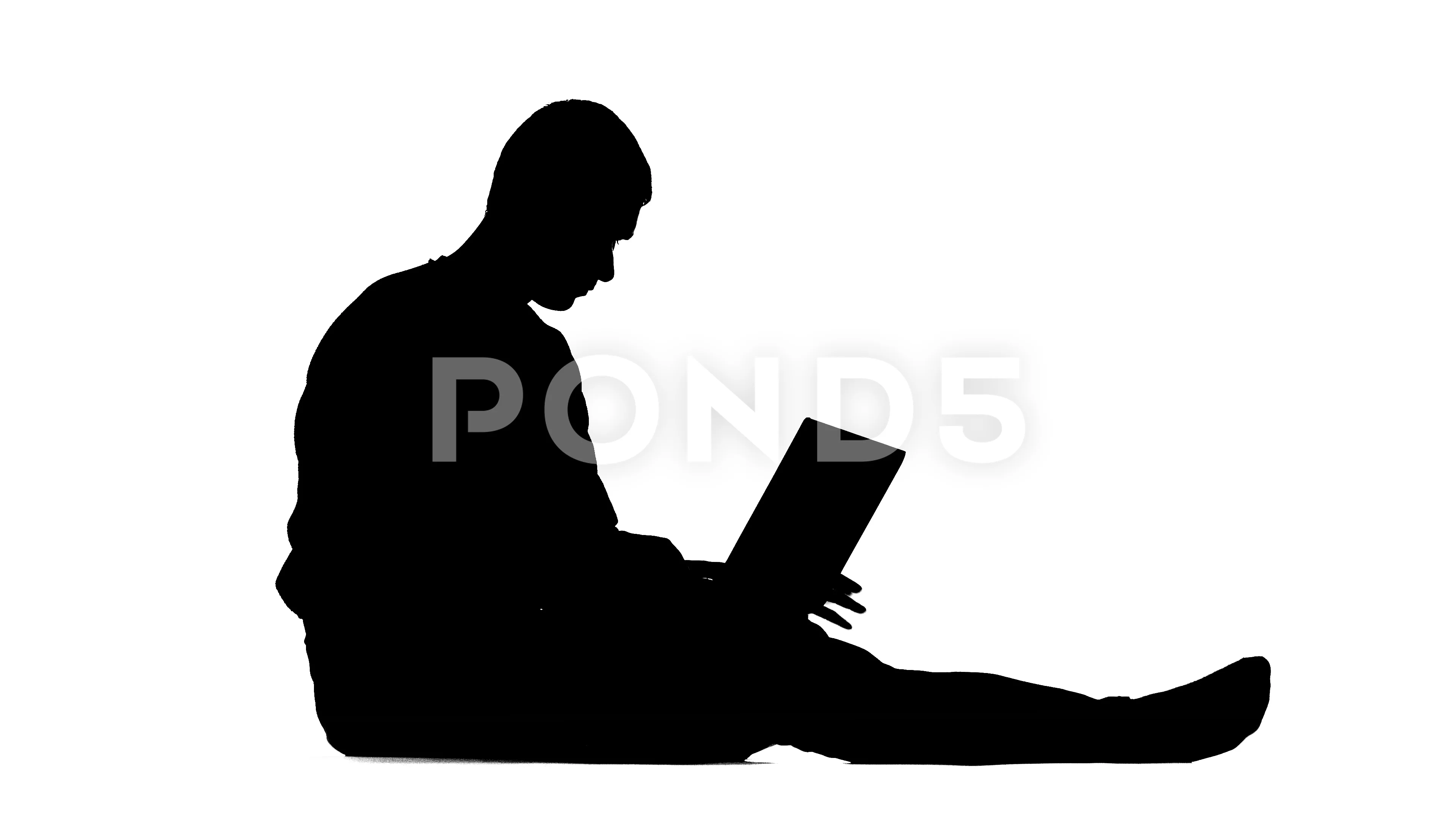 man sitting on ground silhouette
