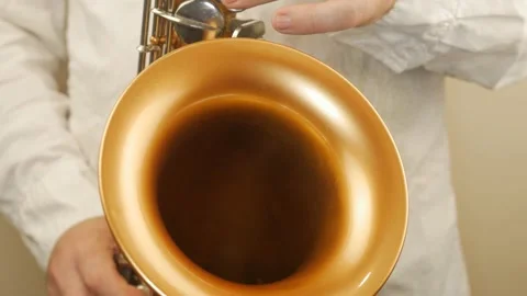A Man Playing An Old Saxophone Stock Footage 153370066