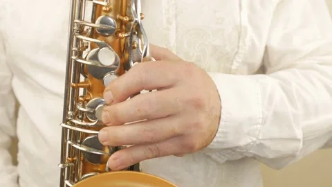 A Man Playing An Old Saxophone Stock Footage 153370070