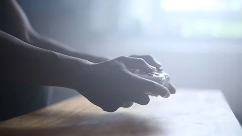Man Playing Online Video Games - Close up of Hands in Natural Lighting Stock Footage 78202425
