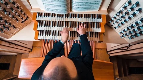 Man Playing By The Organ From Notes Video stock 73673154
