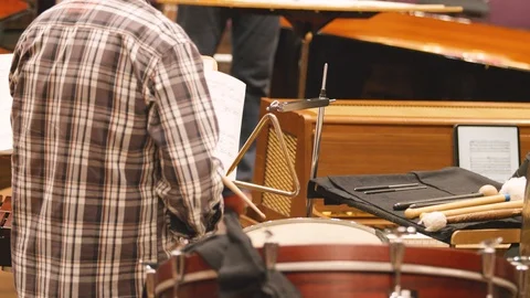 Man playing percussionin orchestra Stock Footage 108370834
