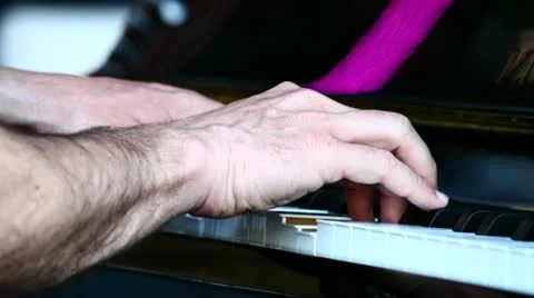 A man playing on piano Stock Footage 11029720
