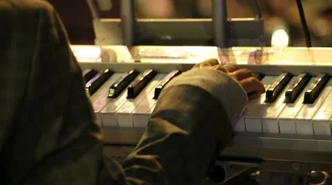A man playing on piano Stock Footage 11340212