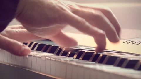A man playing the piano Stock Footage 41277826