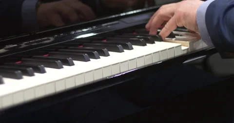 Man Playing Piano Stock Footage 62331056