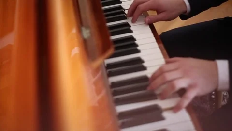 A man playing the piano Video stock 84299289