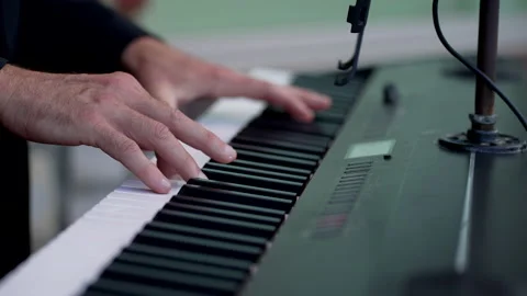 Man playing Piano Stock Footage 213126412