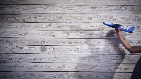 Man playing with the plane Stockbeeldmateriaal 94822935