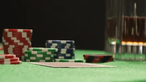 A man playing poker, checking his cards, having a winning combination. Stock Footage 126007224