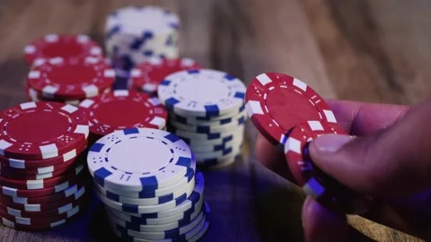 Man playing with poker chips Stock Footage 160917319